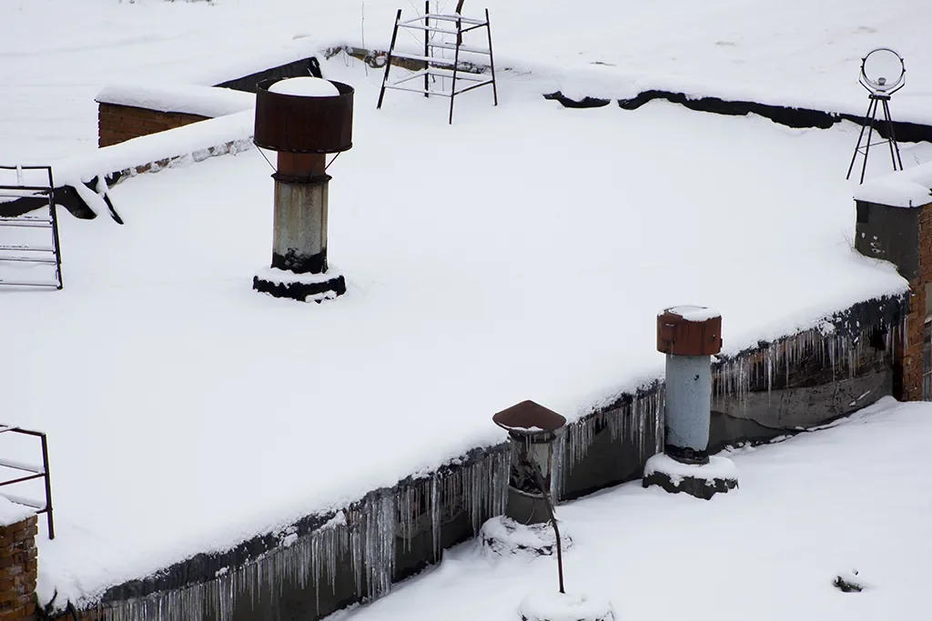 Flat roof damage repair in Post Falls ID